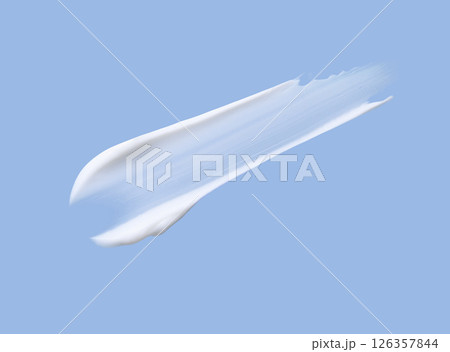White cosmetic cream smear texture on blue 126357844