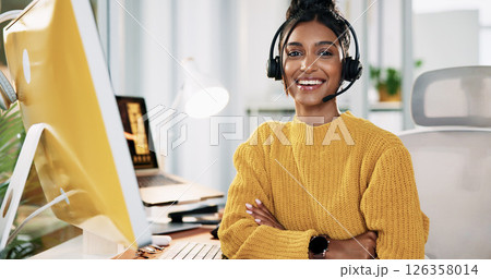 Call center, agent and woman with headset, arms crossed and confident for customer service and smile. Business, representative and person with pride for sales, communication and portrait in India 126358014