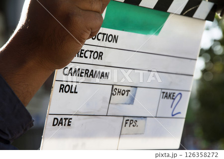 film production crew holding Film Slate on set 126358272