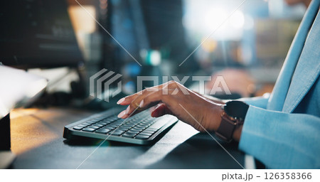 Office, hands and typing with computer for web development, coding and research. Business career, night and programmer with keyboard for programming, software update or professional person in closeup 126358366