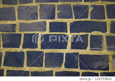 The background is made using mosaic masonry. The background is made using mosaic masonry. 126359691