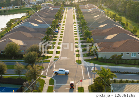 Rich neighborhood with expensive residential homes in southwest Florida. Wealthy suburban area 126361268