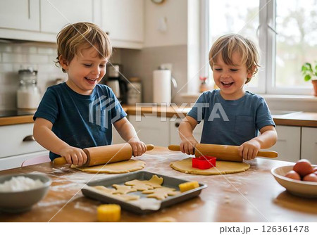 Twin Boys Baking Cookies in Kitchen 126361478