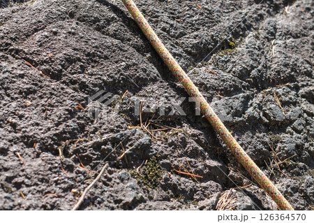 Climber's Rope Across A Positive Slope Climber's Rope Across A Positive Slope 126364570