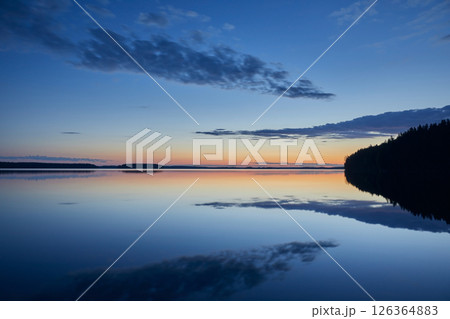 Landscape white nights on the lake with mirror reflections Landscape white nights on the lake with mirror reflections 126364883