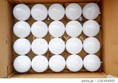 round white LED light bulb. many modern light bulbs in the box round white LED light bulb. many modern light bulbs in the box 126364985