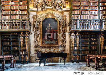 Coimbra, Portugal - Mar 14, 2025: The Johannine Library, Biblioteca Joanina in the University of Coimbra, Portugal Coimbra, Portugal - Mar 14, 2025: The Johannine Library, Biblioteca Joanina in the University of Coimbra, Portugal 126366205