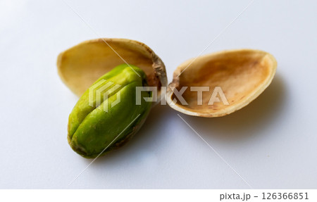 Pistachio grain in its shells . Macro photo. Great source of plant-based protein. 126366851