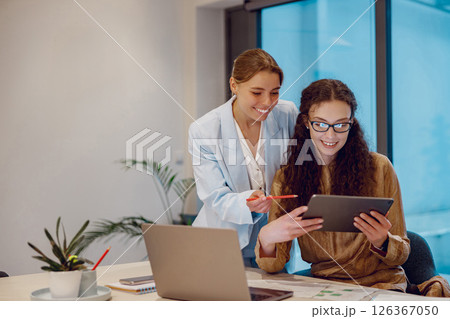 Engaging in a Collaborative Business Meeting Focusing on Technology and Innovation 126367050