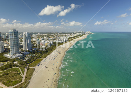 Miami Beach is popular vacation spot in southern Florida. Sandy beach surface and tourist infrastructure Miami Beach is popular vacation spot in southern Florida. Sandy beach surface and tourist infrastructure 126367183