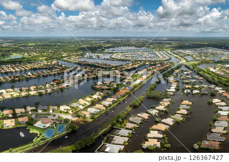 Hurricane flooded homes in residential community in Florida, USA. Aftermath of natural disaster Hurricane flooded homes in residential community in Florida, USA. Aftermath of natural disaster 126367427