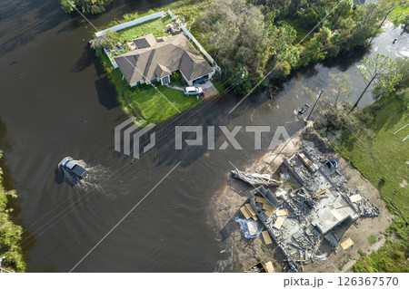 Flooded houses by hurricane rainfall in Florida residential area. Consequences of natural disaster Flooded houses by hurricane rainfall in Florida residential area. Consequences of natural disaster 126367570