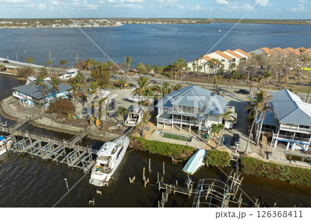 Capsized sunken sailing boat left forsaken on shallow bay waters after hurricane Milton in Englewood, Florida Capsized sunken sailing boat left forsaken on shallow bay waters after hurricane Milton in Englewood, Florida 126368411
