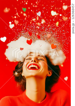 A woman is smiling and wearing a red sweater 126368457