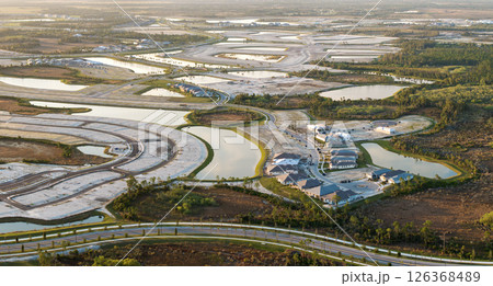 Beginning of construction works on prepared ground. Large building site in American rural area. Development of residential housing in US suburbs. Real estate market in USA 126368489