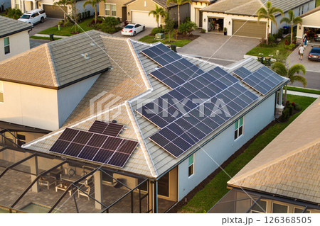 Autonomous home. Solar panels on house roof. Photovoltaic sells for producing clean ecological electric energy. Investing in renewable electricity for retirement income 126368505