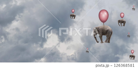 Elephants floating with balloons in a cloudy sky Elephants floating with balloons in a cloudy sky 126368581