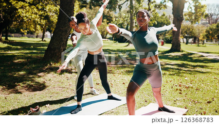 Nature, instructor and women with stretching for yoga, wellness and chakra with support for balance. Outdoor, people and coach with helping for warrior pose, arms exercise and fitness for yogi group 126368783