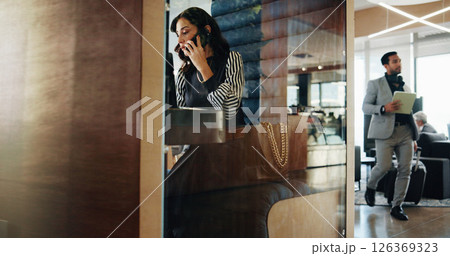 Talking, booth and businesswoman with phone call for advice, asset management and financial account. Portfolio manager, laptop and negotiation in hybrid cubicle for investment, deal or private equity 126369323