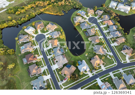Aerial view of spacious family houses in Florida suburban area. Real estate development in American suburbs 126369341