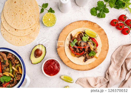 Fajitas, beef meat slices 126370032
