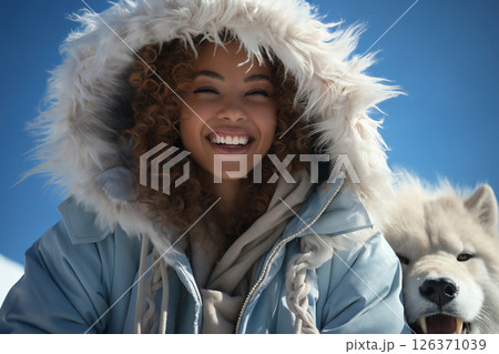 portrait of a woman in winter outdoors, beautiful nature, bright sunny day in the forest and snow 126371039