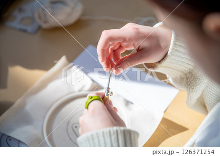 cute teenage girl at carpet embroidery workshop, craft exhibition, craft fair, education, workshops, DIY 126371254