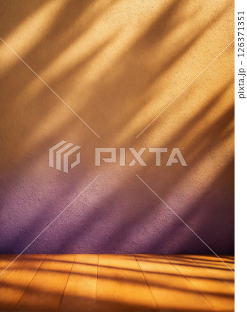 background with blurred foliage shadow on color wall and wooden floor 126371351