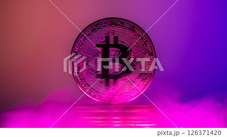 Bitcoin cryptocurrency coin hovering over stack of coins on blue background with smoke, representing investment, finance, and digital currency 126371420