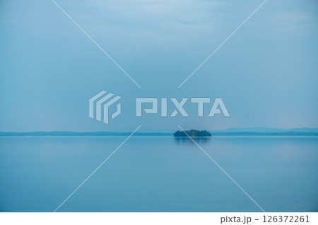 Evening view of the big lake, natural background, summer holiday, calm and tranquility 126372261