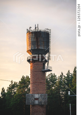 old brick water tower, a means of providing water to the population old brick water tower, a means of providing water to the population 126372264