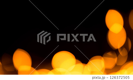 Bright yellow, gold lights, bokeh on black background 126372505