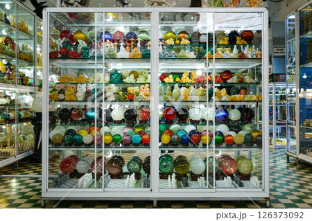 Vibrant Display of Stone Spheres and Carved Gemstone Figurines in Inside an Stone Shop, Vietnam 126373092