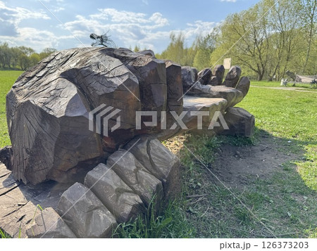 Massive Wooden Hand Carved into Artistic Park Bench Massive Wooden Hand Carved into Artistic Park Bench 126373203