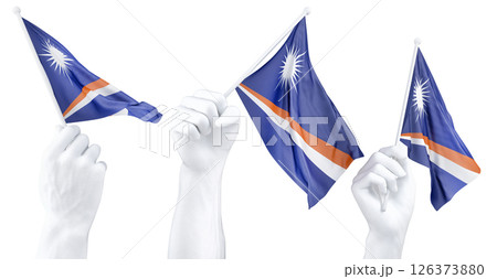 Hand holding flag of Marshall Islands. Isolated 3d Rendering 126373880