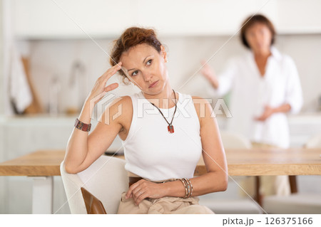 Family quarrel - two Women fight in Kitchen Family quarrel - two Women fight in Kitchen 126375166
