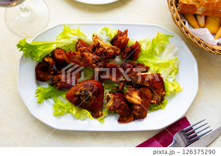 Toston cuchifrito, roasted suckling pig, Spanish cuisine 126375290