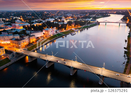 Aerial view of Tver on Volga with illuminated embankment in summer twilight 126375291