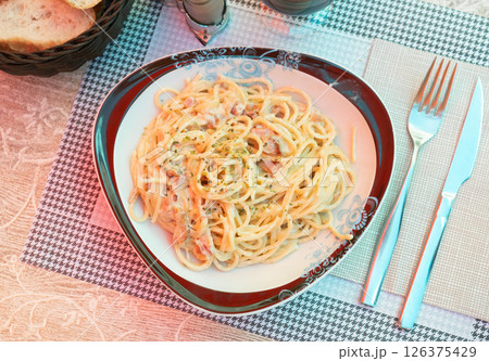 Carbonara pasta, spaghetti with pancetta, parmesan cheese and cream sauce. Traditional italian cuisine 126375429