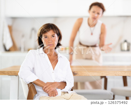 Two women sort things out during family quarrel at home Two women sort things out during family quarrel at home 126375492