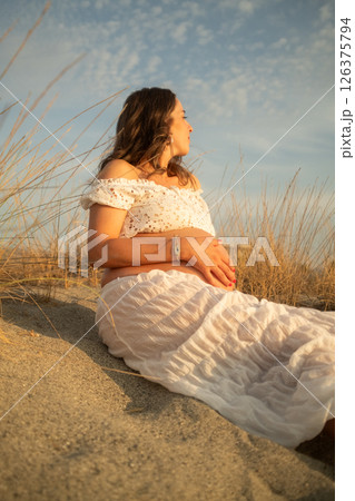 The Blue Sky Over A Pregnant Mother The Blue Sky Over A Pregnant Mother 126375794