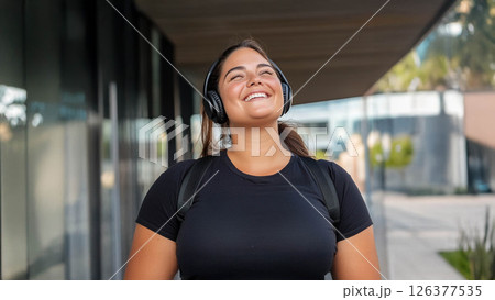Plus size woman focused on training with battle ropes in the gym, showcasing strength and determination. Generated image 126377535