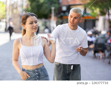 Quarrel between guy and girl during walk Quarrel between guy and girl during walk 126377710
