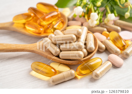 Alternative medicine herbal organic capsule drug herb. 126379810