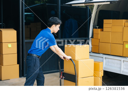 Portrait of courier delivery man searching the address on digital tablet. Delivery service, 126381536