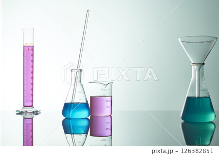 Colorful Laboratory Glassware for Modern Science and Research Background. 126382851