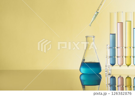 Colorful Laboratory Glassware for Modern Science and Research Background. 126382876