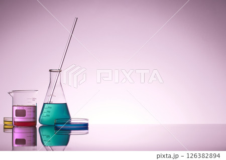 Colorful Laboratory Glassware for Modern Science and Research Background. Colorful Laboratory Glassware for Modern Science and Research Background. 126382894