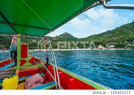 Wooden boat trip to the sea at Koh Tao, snorkeling at the island, summer activities Wooden boat trip to the sea at Koh Tao, snorkeling at the island, summer activities 126383217