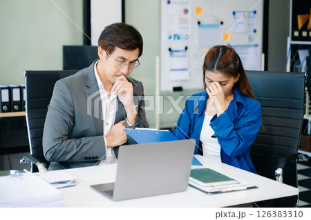 workplace stress and conflict with this intense scene of professionals in a heated office discussio workplace stress and conflict with this intense scene of professionals in a heated office discussio 126383310